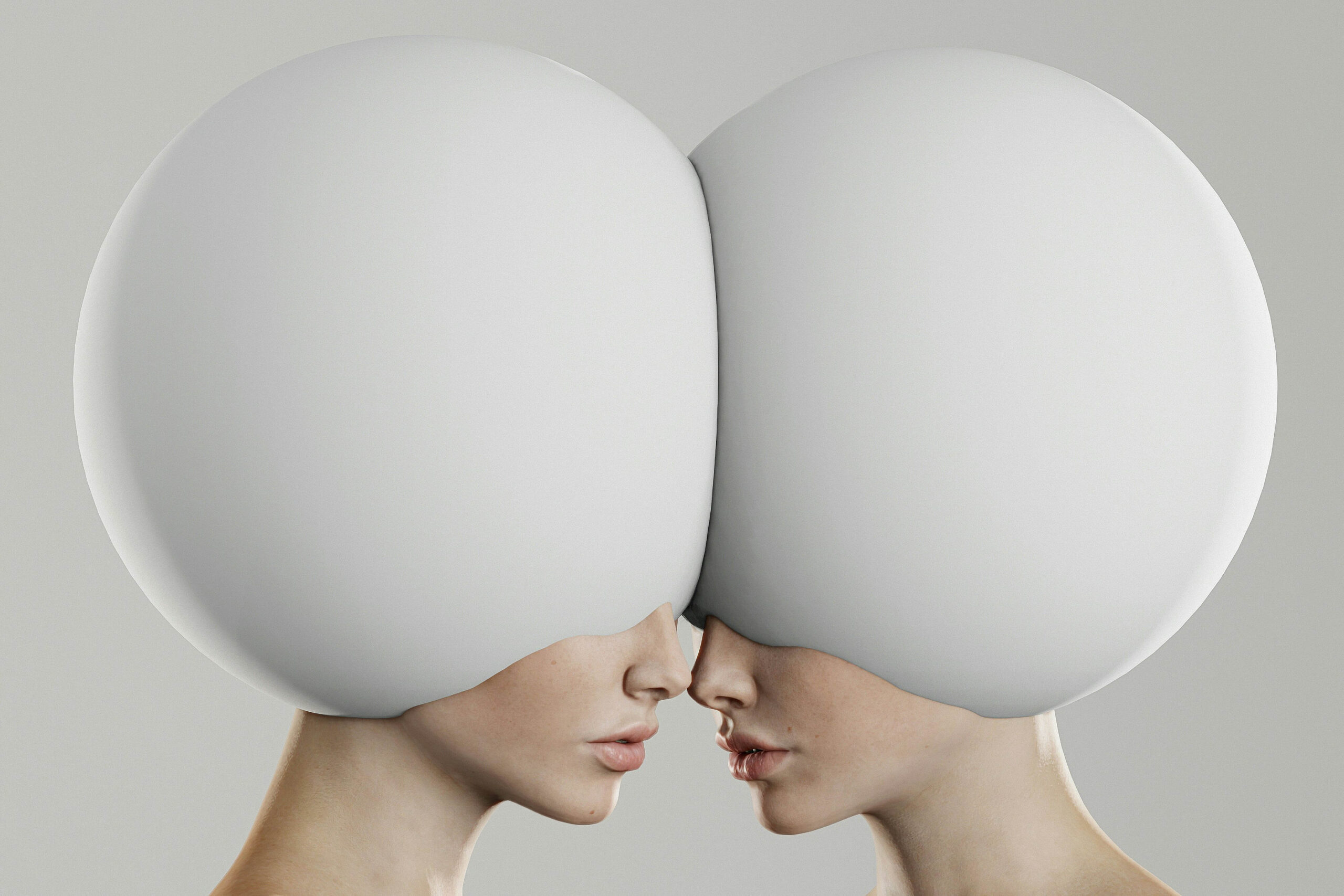 Two individuals with oversized, smooth white headgear touching forehead to forehead, visually representing the distinctions in usage between the terms 'sensei' and 'kyoushi'.
