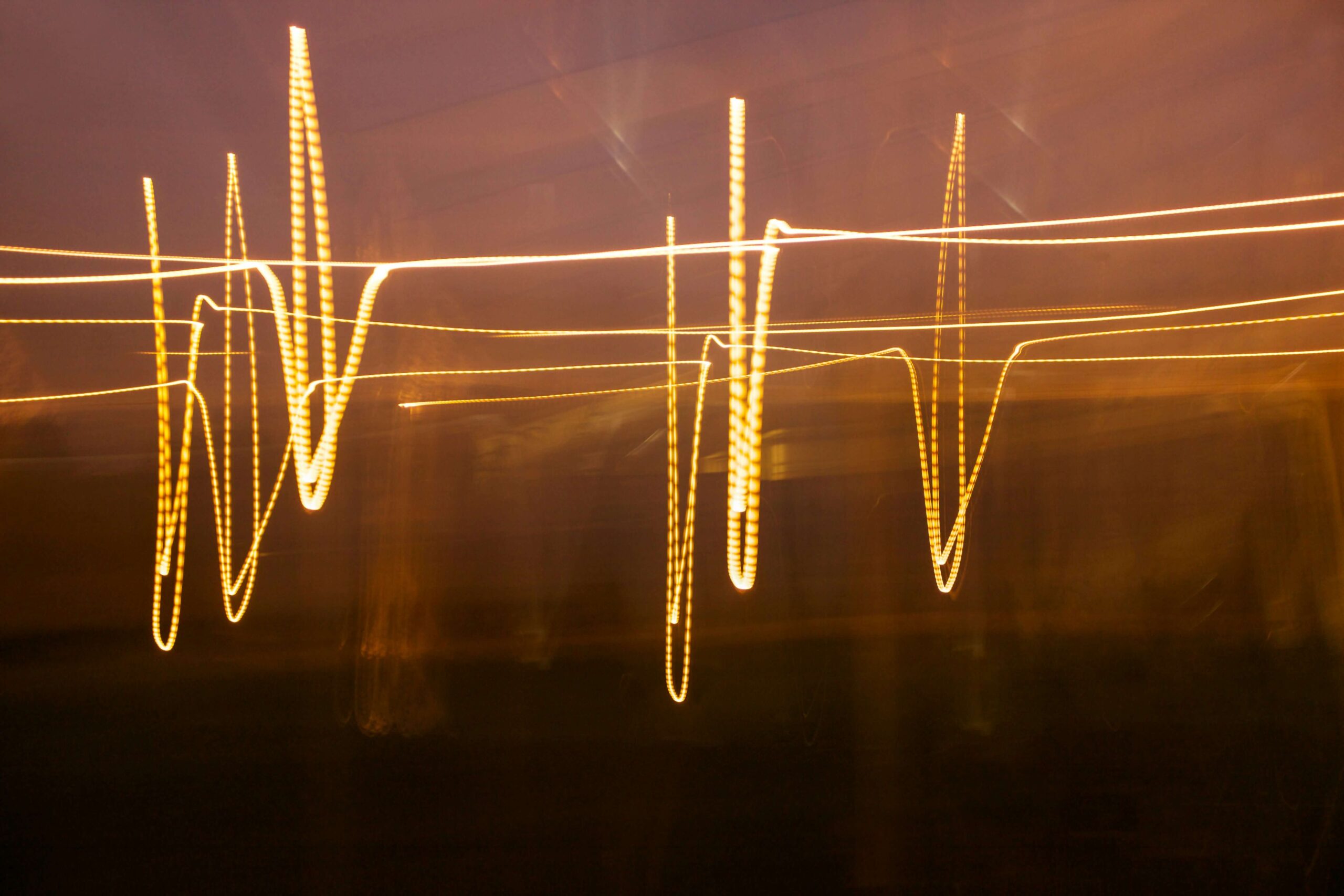  This image represents Frequency Adverbs, showing dynamic, repetitive light patterns to symbolize the concept of actions happening at various intervals.
