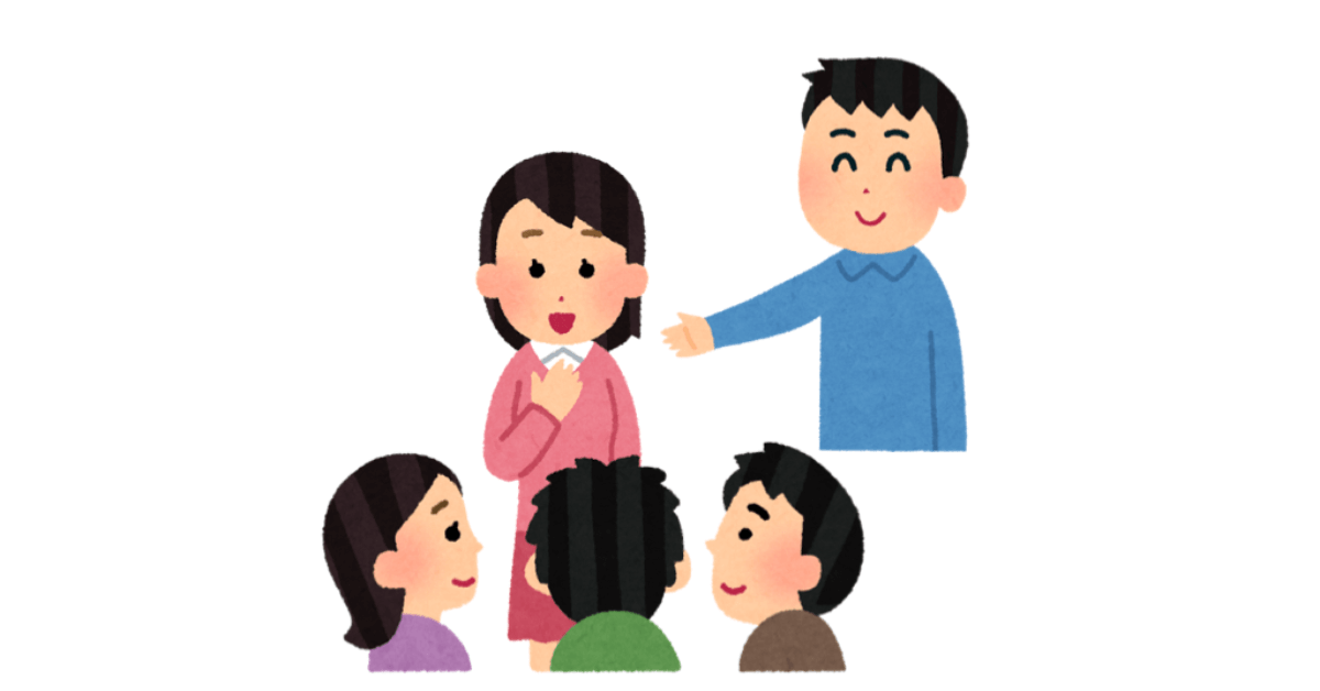 An illustration of a person introducing another person to a group, representing the phrase "こちらはすずきさんです。" (Kochira wa Suzuki-san desu) - This is Ms. Suzuki.
